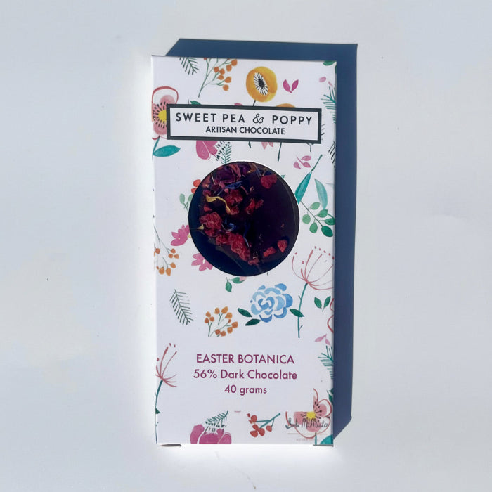 Sweet Pea & Poppy dark chocolate Easter Botanica artisan chocolate bar in floral packaging on a white background