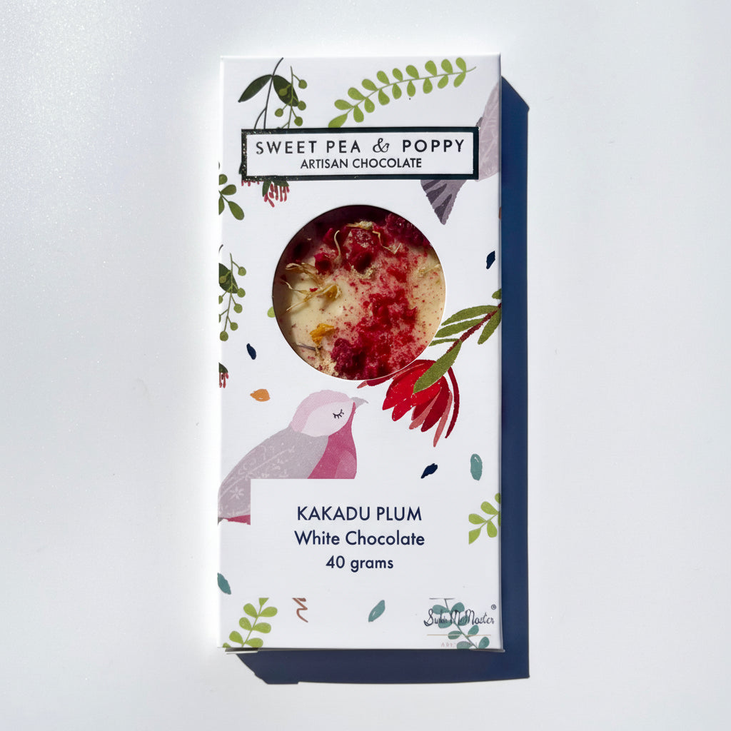 Sweet Pea & Poppy Kakadu Plum White Chocolate packaging on a light gray background