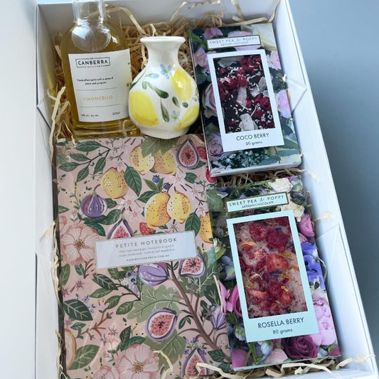 an chocolate bars and a lemon and fig notebook