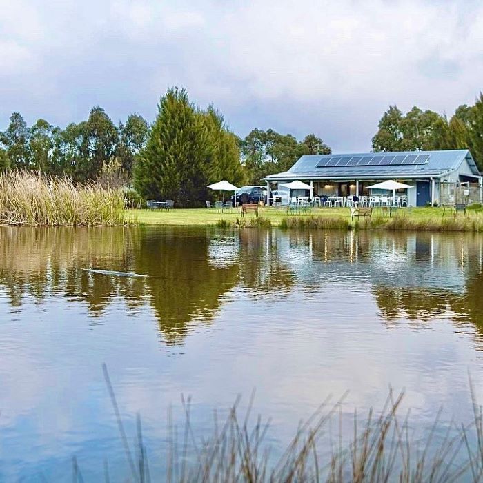 The Sweet Pea & Poppy chocolate studio with the dam and country view in the foreground