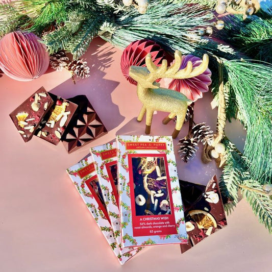 A festive scene with Sweet Pea & Poppy A Christmas Wish Artisan Chocolate bars