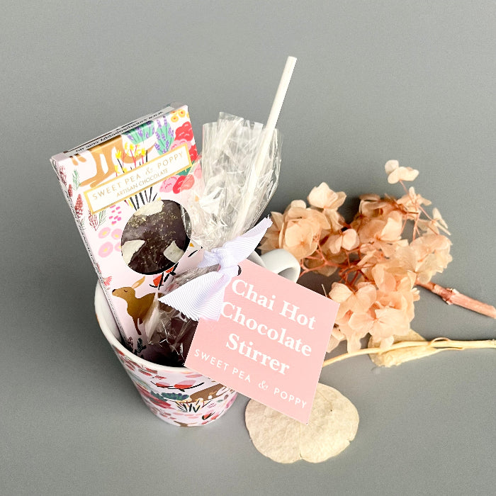 Chai Hot Chocolate Surtex package with decorative elements on a gray background