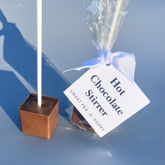 Two milk chocolate, hot chocolate stirrers