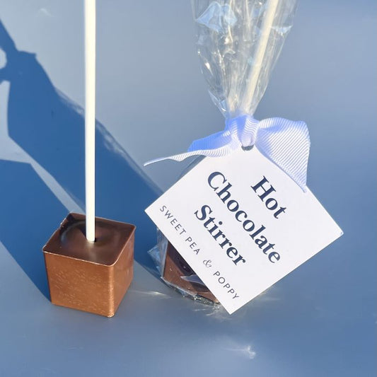 Two milk chocolate, hot chocolate stirrers